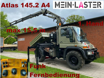 Самосвал, Автоманипулятор Unimog U 400 Seilwinde Atlas 145.2 A4 15.5 m Funk FB: фото 1