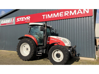 Steyr 6115 - Трактор: фото 1