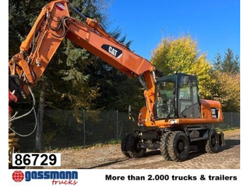 Колёсный экскаватор CATERPILLAR M318D