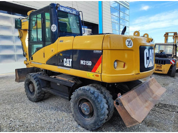 Колёсный экскаватор CATERPILLAR M315D
