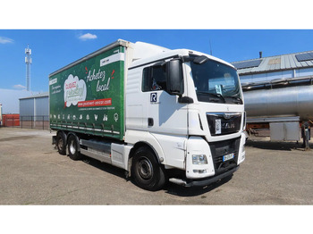 Тентованный грузовик MAN TGX 18.480