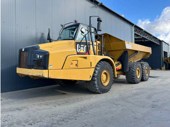 Сочленённый самосвал CATERPILLAR