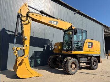 Колёсный экскаватор CATERPILLAR M320F