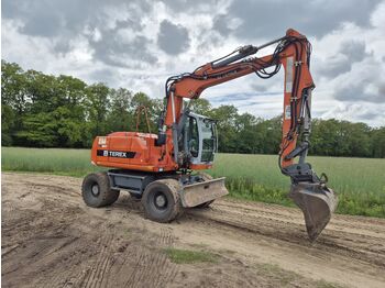Колёсный экскаватор TEREX