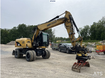 Колёсный экскаватор CATERPILLAR M313D