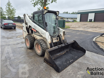 Мини-погрузчик с бортовым поворотом BOBCAT