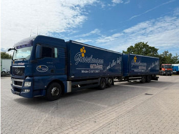 Грузовик для перевозки напитков MAN TGA Schwenkwand-Getränkeaufbau incl. Anhänger: фото 2 Грузовик для перевозки напитков MAN TGA Schwenkwand-Getränkeaufbau incl. Anhänger: фото 2