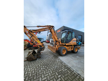 Колёсный экскаватор CASE