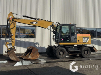 Колёсный экскаватор CATERPILLAR M313D