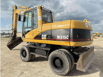 Колёсный экскаватор CATERPILLAR M315C