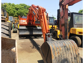 Колёсный экскаватор DOOSAN