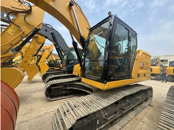 Гусеничный экскаватор CATERPILLAR 323