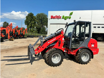 Компактный фронтальный погрузчик