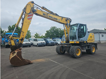 Колёсный экскаватор NEW HOLLAND