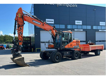 Колёсный экскаватор DOOSAN DX140W-5