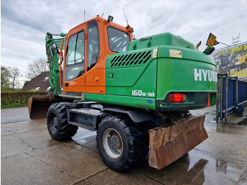 Колёсный экскаватор HYUNDAI