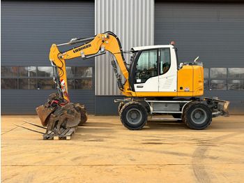 Колёсный экскаватор LIEBHERR A 910