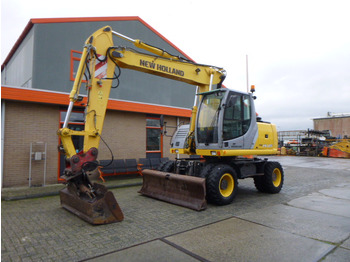 Колёсный экскаватор NEW HOLLAND
