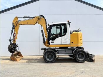 Колёсный экскаватор LIEBHERR A 910
