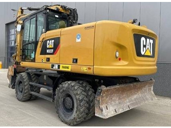 Колёсный экскаватор CATERPILLAR M322