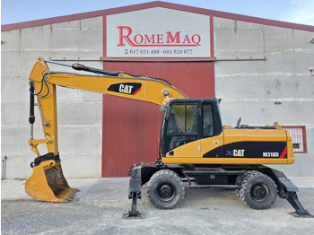Колёсный экскаватор CATERPILLAR M318D