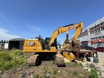 Гусеничный экскаватор CATERPILLAR 323