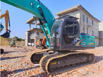 Гусеничный экскаватор KOBELCO
