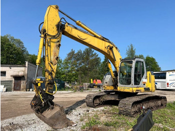 Гусеничный экскаватор NEW HOLLAND