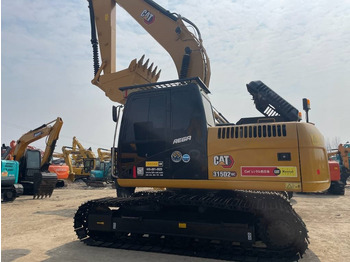 Гусеничный экскаватор CATERPILLAR
