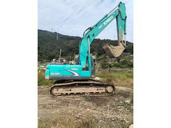 Гусеничный экскаватор KOBELCO