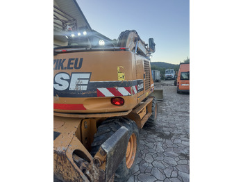 Колёсный экскаватор Case WX145: фото 5