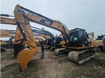Гусеничный экскаватор CATERPILLAR 320D2