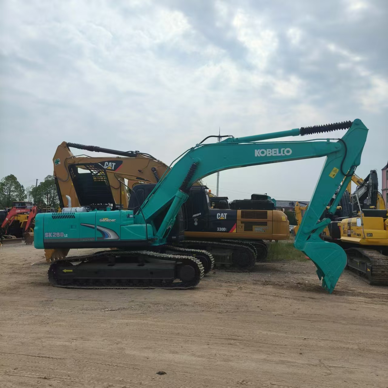 Гусеничный экскаватор KOBELCO