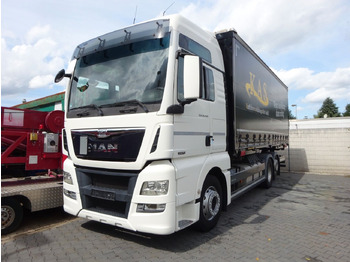Грузовик-контейнеровоз/ Сменный кузов MAN TGX 26.440