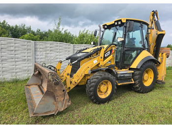 Экскаватор-погрузчик CATERPILLAR