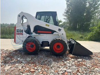 Мини-погрузчик с бортовым поворотом BOBCAT