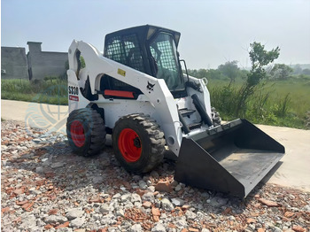 Мини-погрузчик с бортовым поворотом BOBCAT 330: фото 3