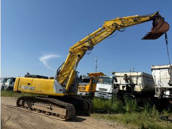 Гусеничный экскаватор NEW HOLLAND