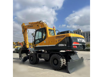 Колёсный экскаватор HYUNDAI