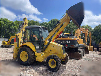 Экскаватор-погрузчик NEW HOLLAND