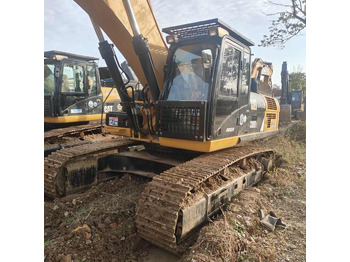 Гусеничный экскаватор CATERPILLAR