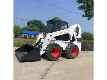 Мини-погрузчик с бортовым поворотом BOBCAT