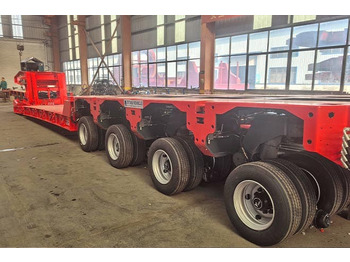 Новый Низкорамный полуприцеп для транспортировки тяжёлой техники TITAN 4 Axle Extendable Lowboy Trailer for Sale in Nigeria: фото 2 Новый Низкорамный полуприцеп для транспортировки тяжёлой техники TITAN 4 Axle Extendable Lowboy Trailer for Sale in Nigeria: фото 2