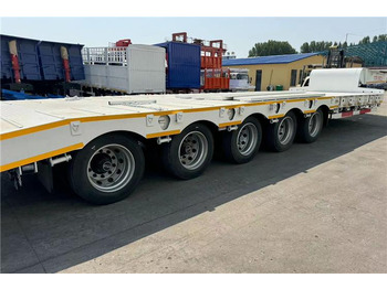 Новый Низкорамный полуприцеп TITAN 5 Axle 100 Ton Low Bed Trailer for Sale In Tanzania: фото 3 Новый Низкорамный полуприцеп TITAN 5 Axle 100 Ton Low Bed Trailer for Sale In Tanzania: фото 3