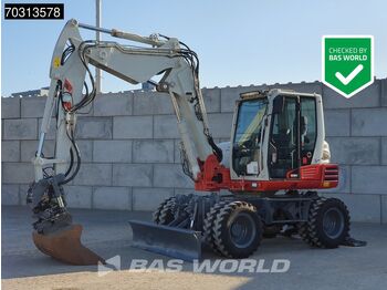 Колёсный экскаватор TAKEUCHI