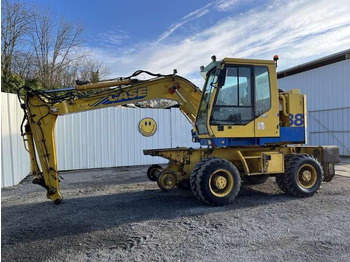 Колёсный экскаватор CASE 788