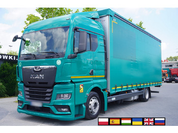 Тентованный грузовик MAN TGX 18.470