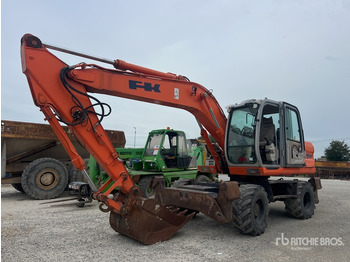 Колёсный экскаватор KOBELCO