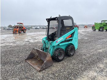 Мини-погрузчик с бортовым поворотом