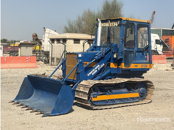 Гусеничный погрузчик KOMATSU